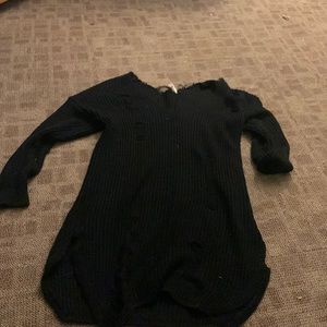 Ripped and tapered sweater